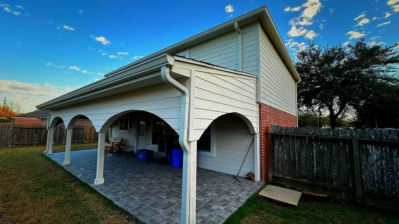 New seamless gutter system installed on a residential property